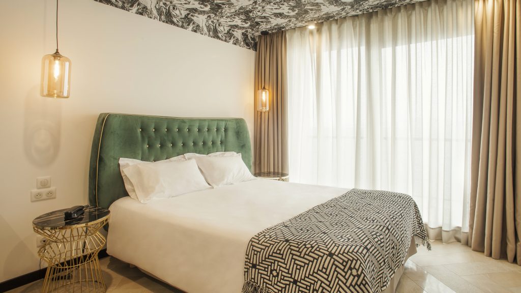 foto-camera-comfort-letto-hotel-la-pietra